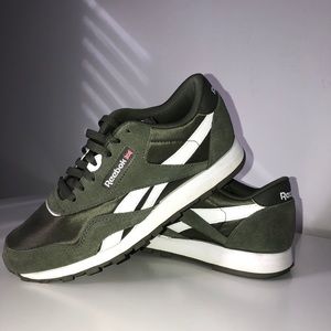 Khaki green and white Reebok sneakers